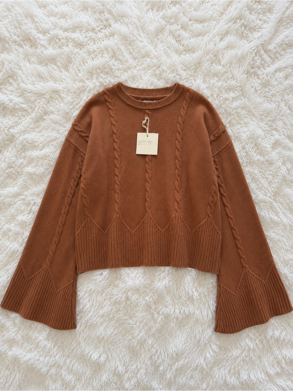 Marled bell sleeve sweater